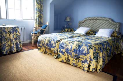 Yellow and Blue Bedroom Featuring Toille de Jouy Fabric 