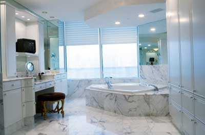 White - ever popular for bathrooms, especially in traditional marble. 