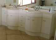 Double basins - shown here semi recessed, are a luxury item for couples or busy families sharing the same bathroom space.