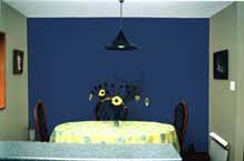 Feature dining room wall color blue.