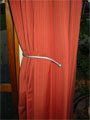 Curtain accessories - A hold back is a decorative rigid form of tie back
