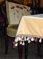 Tassel fringe shown here on the edge of this table cloth.