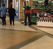Solid Flooring - Colored Concrete Screed in a mall situation.