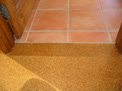 Home Design Tips - Junction between Tiles and Cork, made tidy with a simple stainless steel junction which is almost invisible.