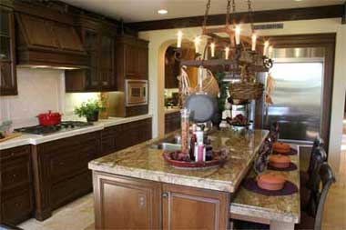 Dark timber cabinets with stone and ceramic finishes