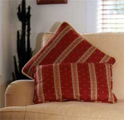 Red suggests luxury, great to use as an accent in a living room with cushions.